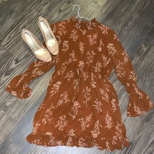 high collared dress with ruffle detail